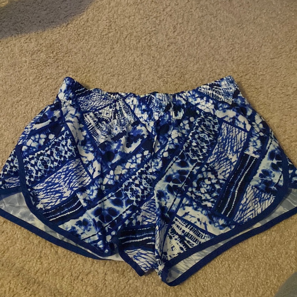 Blue and white patterned running shorts